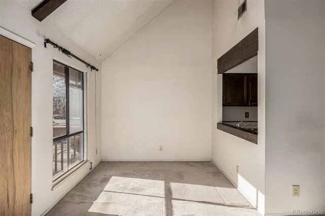 a view of a hallway to a building