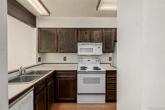 a view of a chandelier fan in a room