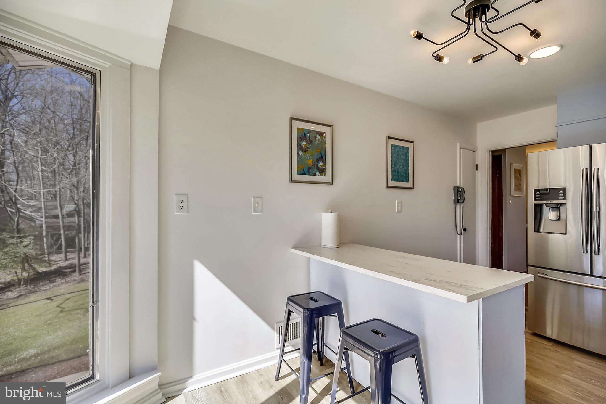 400 Stonington Road Silver Spring, MD 20902 - Photo 11 of 66 a view of a livingroom with furniture and window