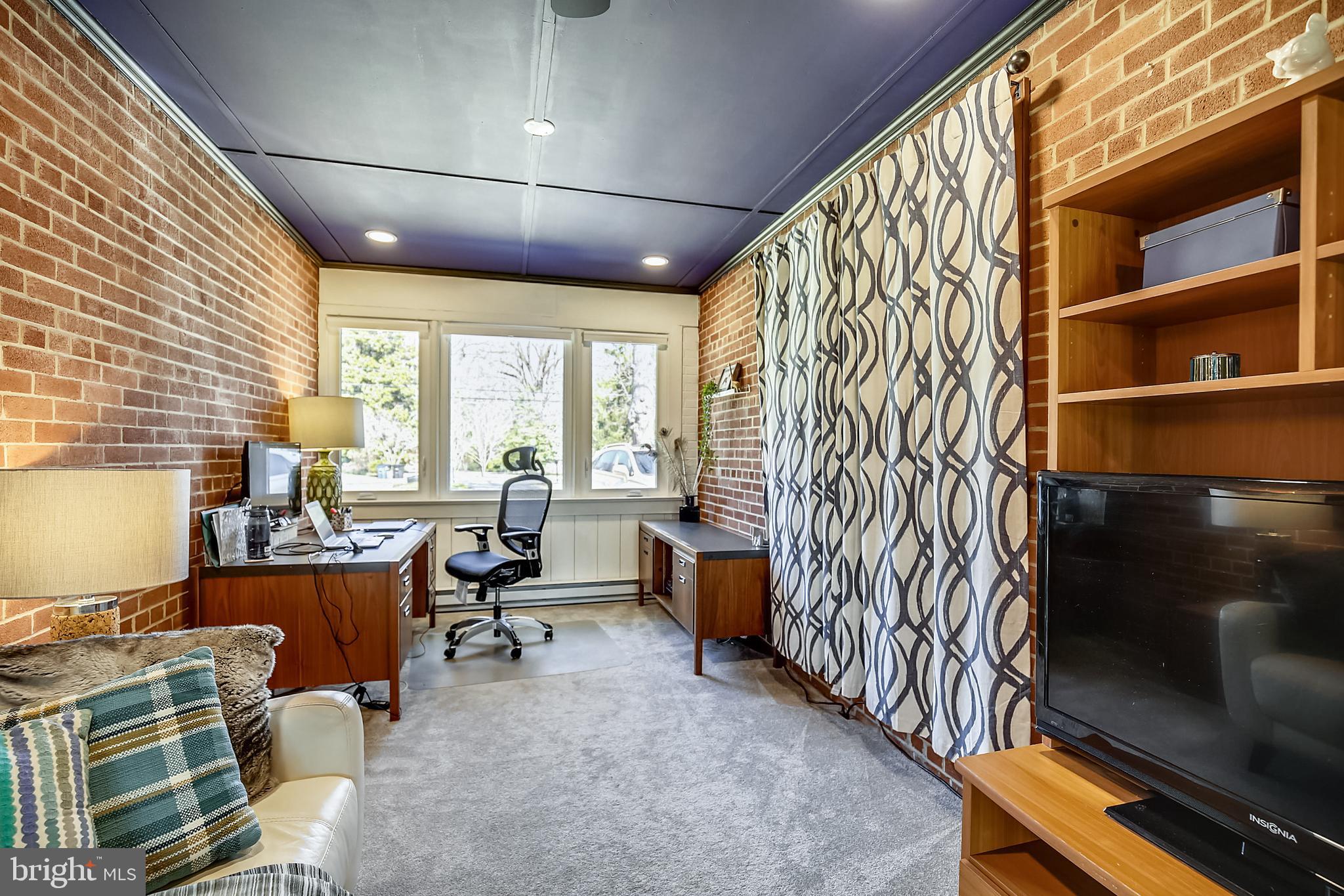 400 Stonington Road Silver Spring, MD 20902 - Photo 18 of 66 a room with lots of furniture and a window