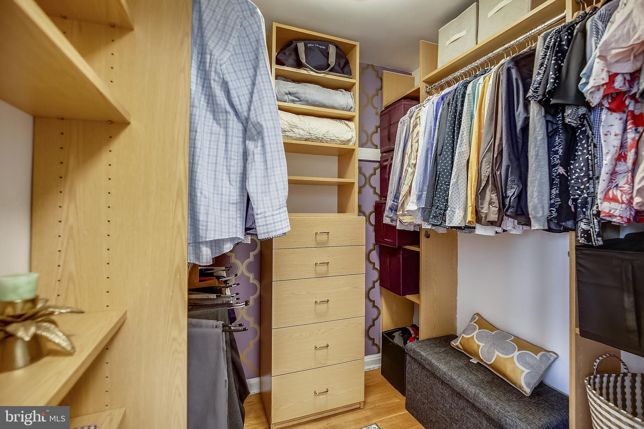 400 Stonington Road Silver Spring, MD 20902 - Photo 25 of 66 a view of walk in closet with clothes and shoes