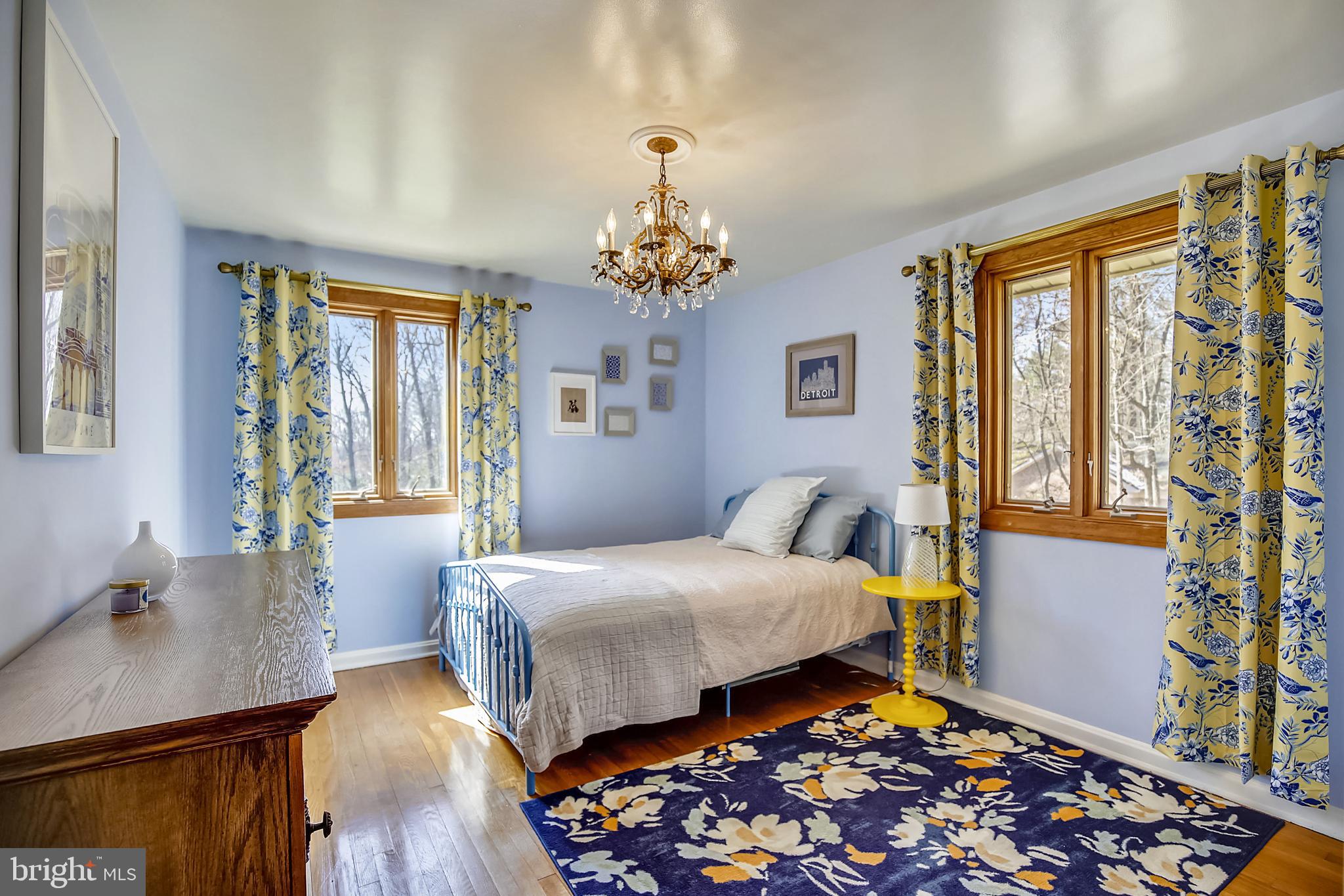 400 Stonington Road Silver Spring, MD 20902 - Photo 26 of 66 a bedroom with a bed and a table