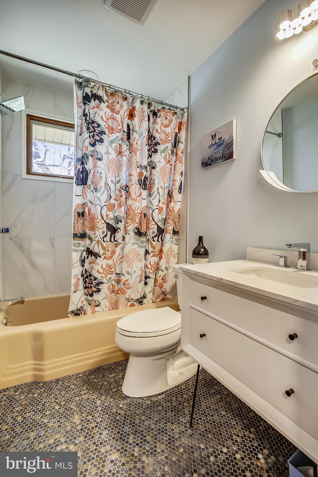 400 Stonington Road Silver Spring, MD 20902 - Photo 28 of 66 a bathroom with a sink toilet and shower