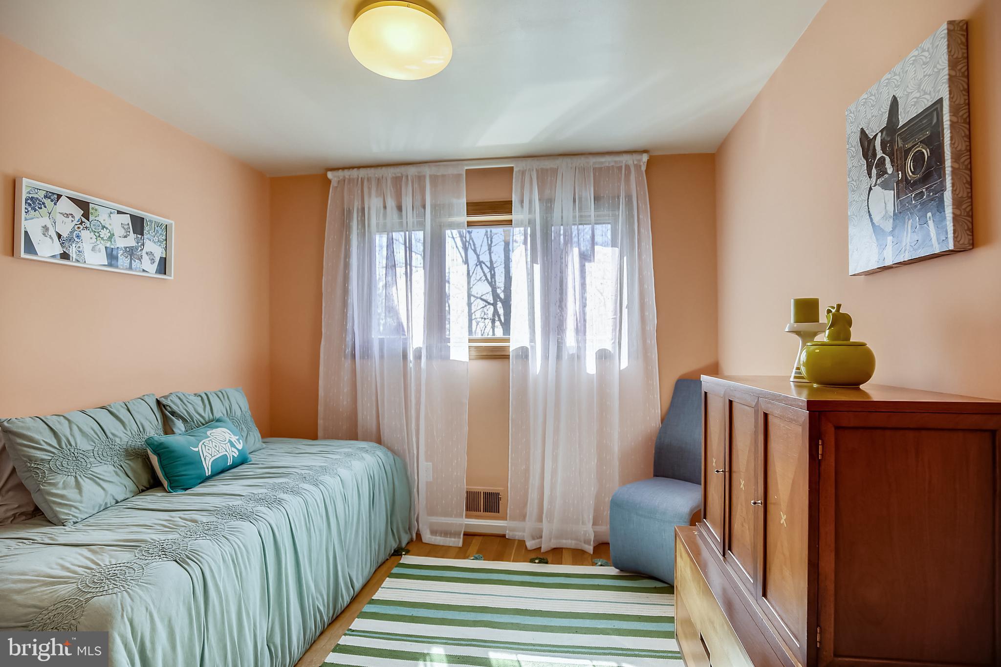 400 Stonington Road Silver Spring, MD 20902 - Photo 29 of 66 a bedroom with a bed and window