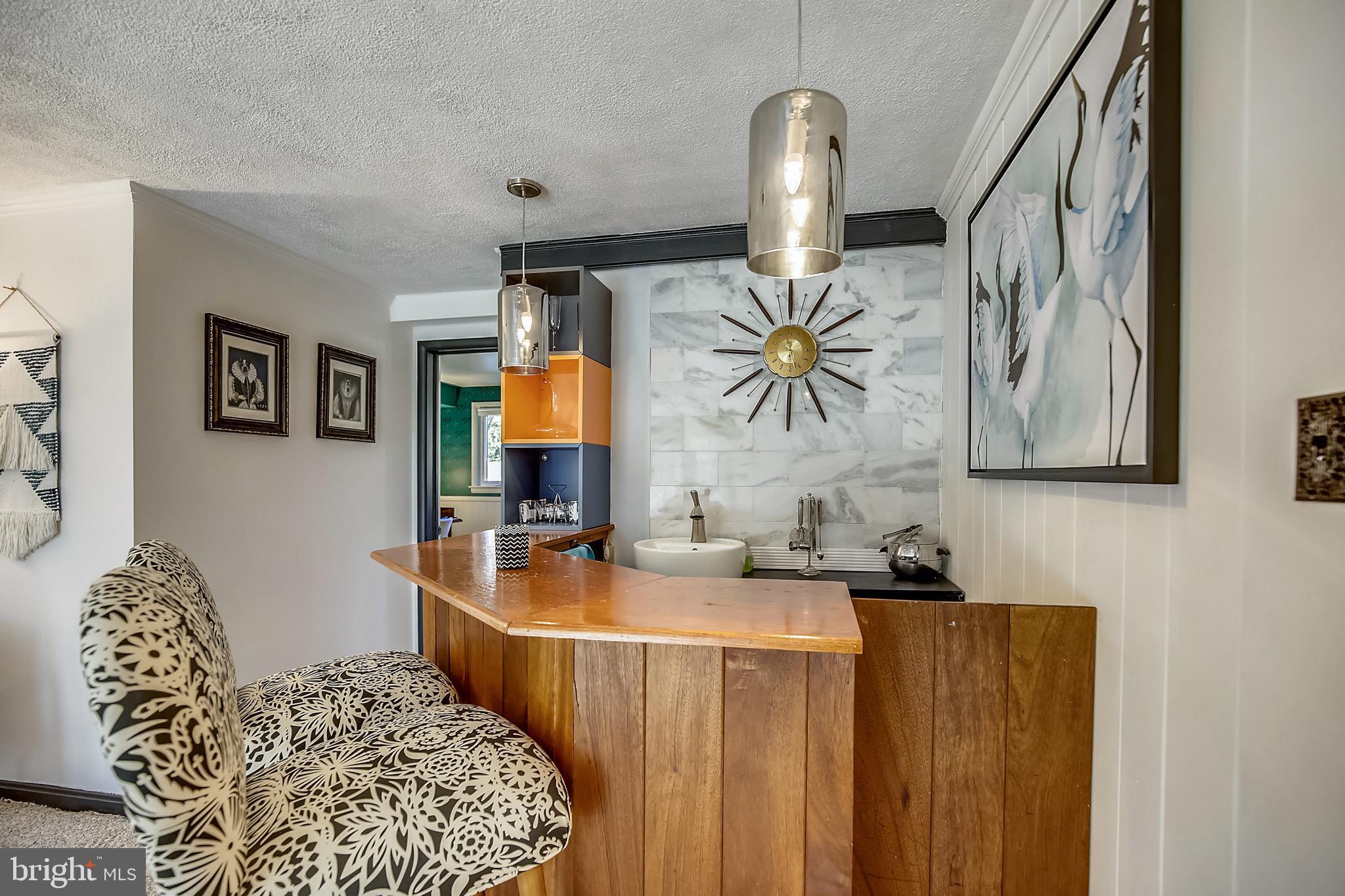 400 Stonington Road Silver Spring, MD 20902 - Photo 35 of 66 a bedroom with bed and wooden floor