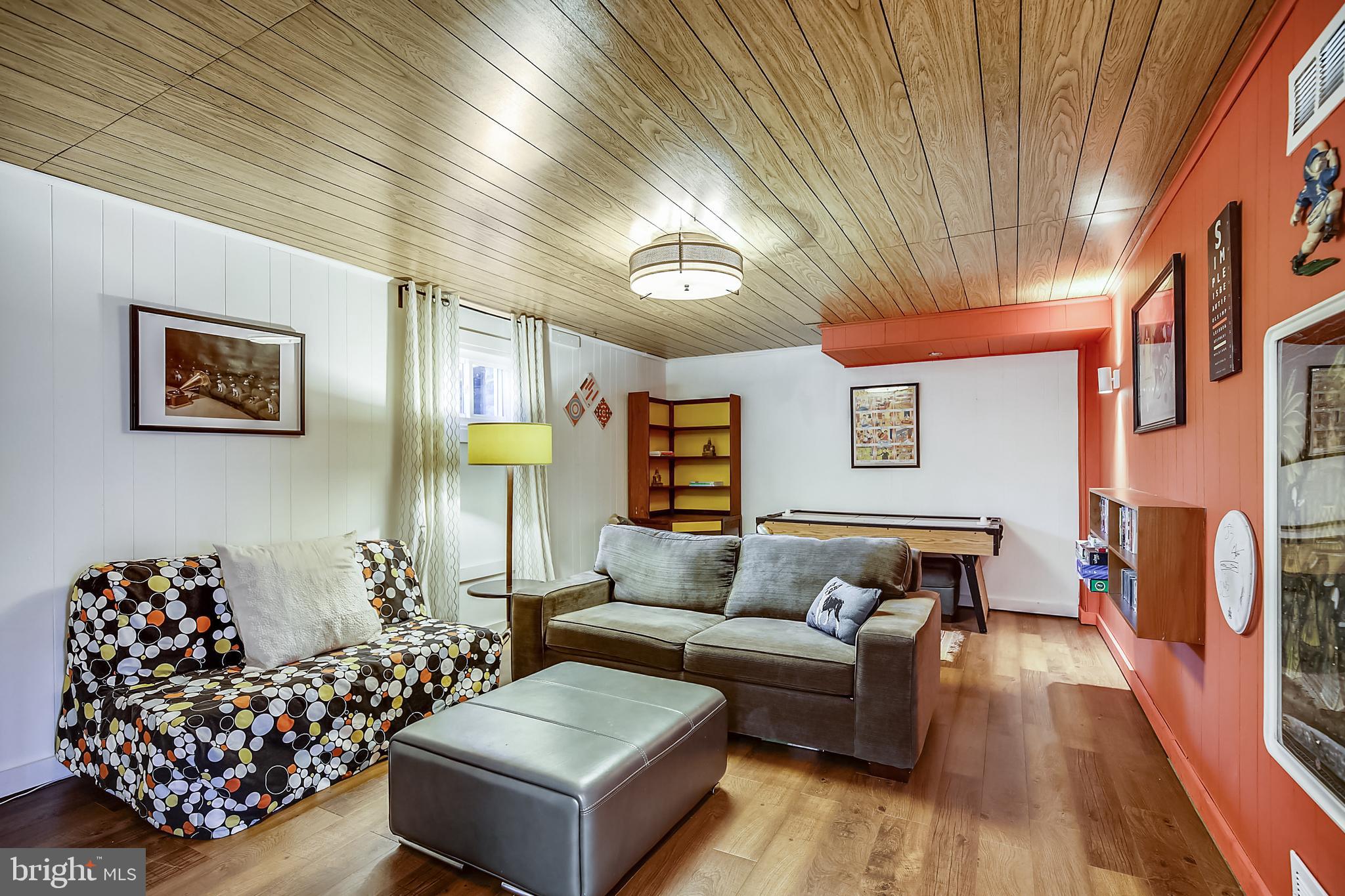 400 Stonington Road Silver Spring, MD 20902 - Photo 44 of 66 a living room with furniture and a couch