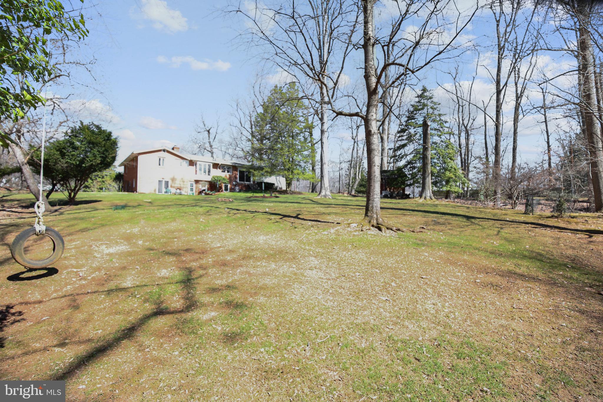 400 Stonington Road Silver Spring, MD 20902 - Photo 50 of 66 a backyard of apartments with large trees