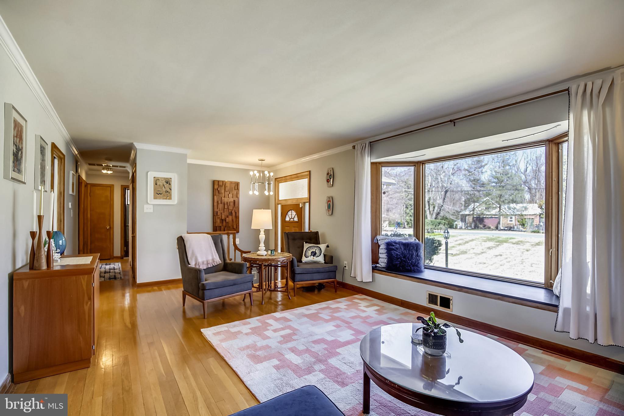 400 Stonington Road Silver Spring, MD 20902 - Photo 5 of 66 a living room with furniture and wooden floor