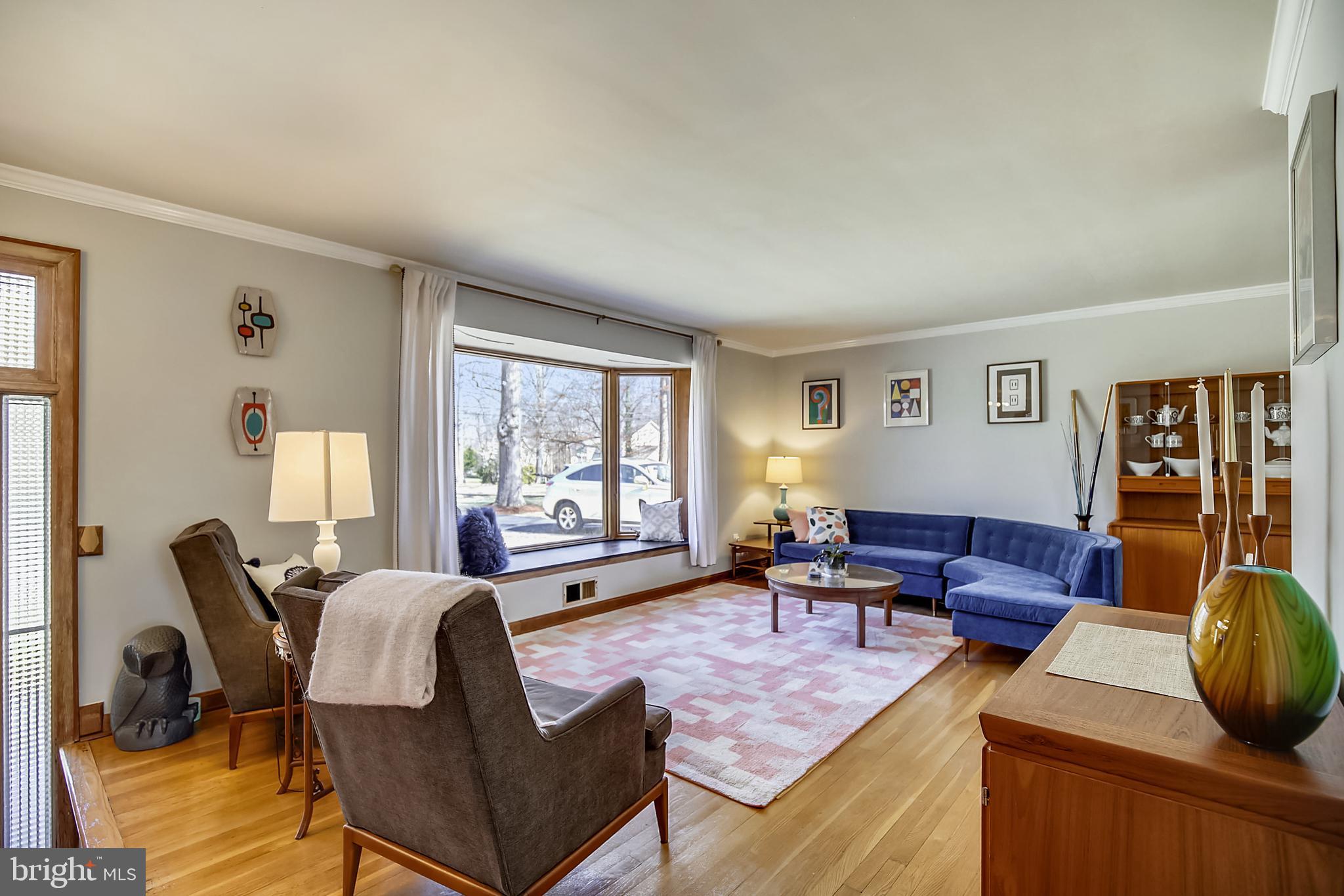 400 Stonington Road Silver Spring, MD 20902 - Photo 7 of 66 a living room with furniture and a window