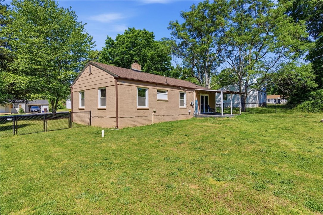 307 South Elm Street Pendleton, SC 29670 - Photo 34 of 41 This charming home offers a sprawling backyard, perfect for outdoor enjoyment and serene living.