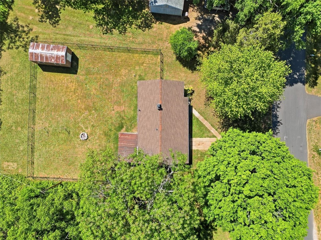 307 South Elm Street Pendleton, SC 29670 - Photo 39 of 41 An aerial view showcases a residential property with ample yard space and mature trees.