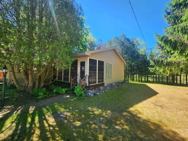 $360,000 | 18219 Northwood Highway, Arcadia, MI 49613