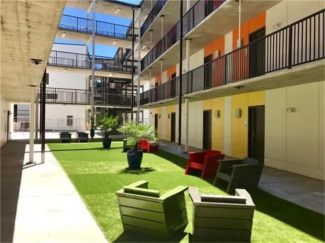 a view of a garden with a house