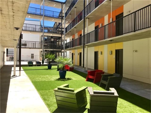 3550 Main Street, Unit 4215 Houston, TX 77002 - Photo 12 of 49 a backyard of a house with seating space