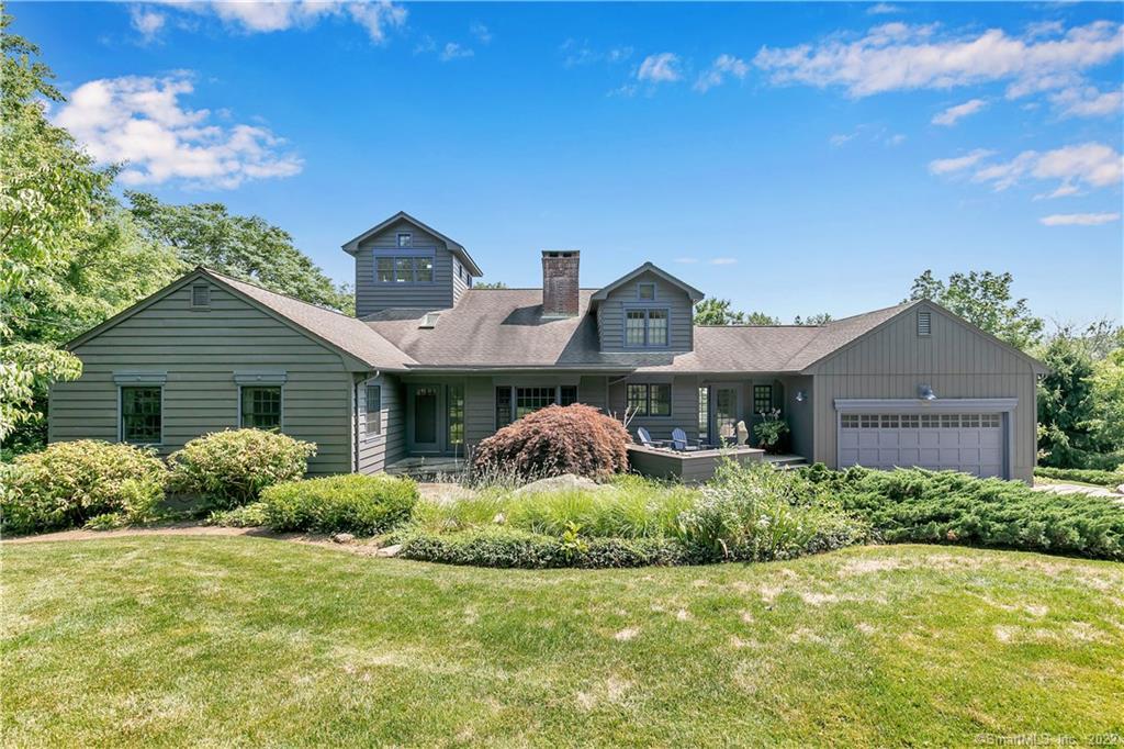 360 Colonial Road Guilford, CT 06437 - Photo 1 of 1 a front view of a house with garden