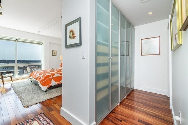 a en suite bathroom with a shower and a sink