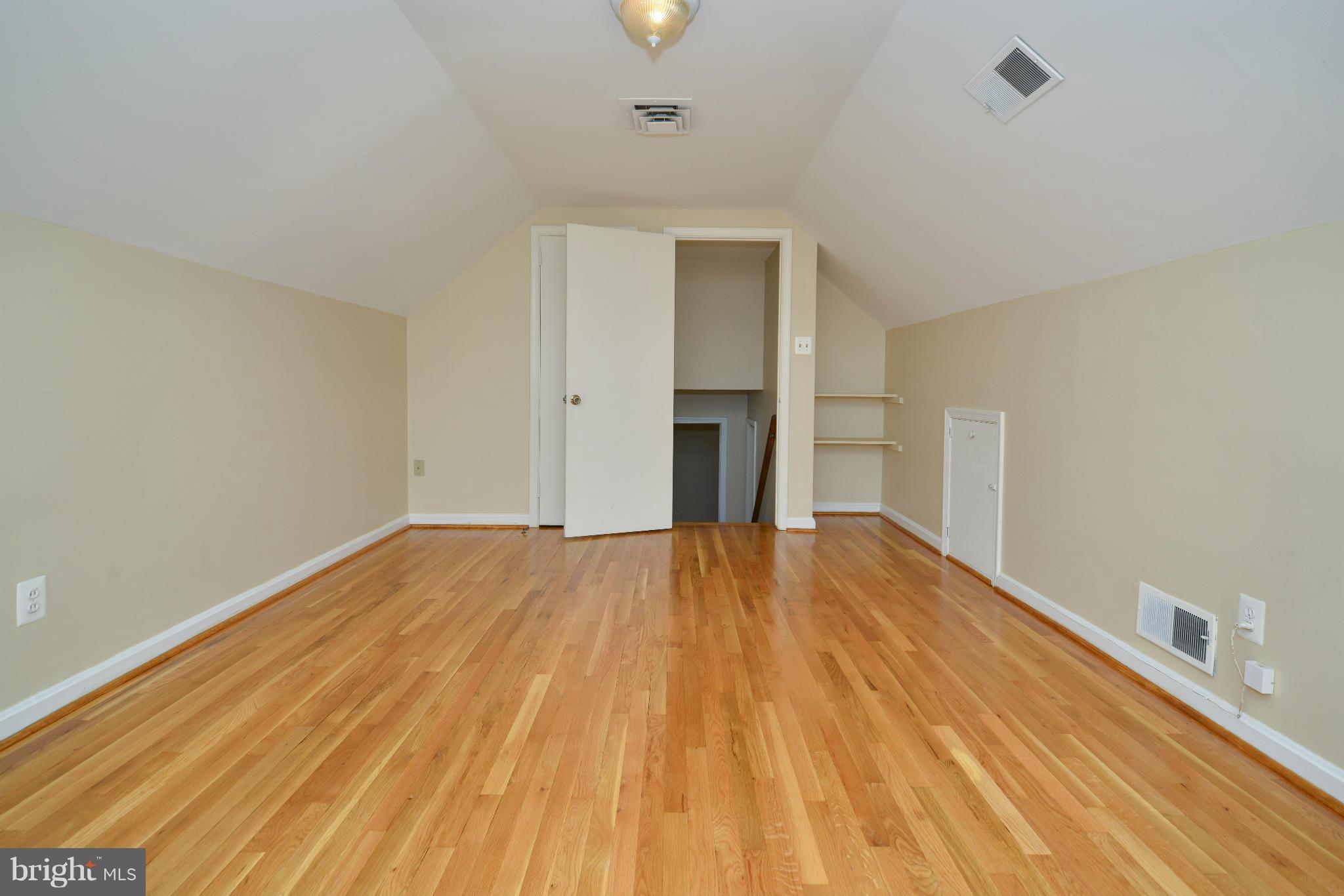 6902 Highland Street Springfield, VA 22150 - Photo 14 of 24 a view of empty room with wooden floor