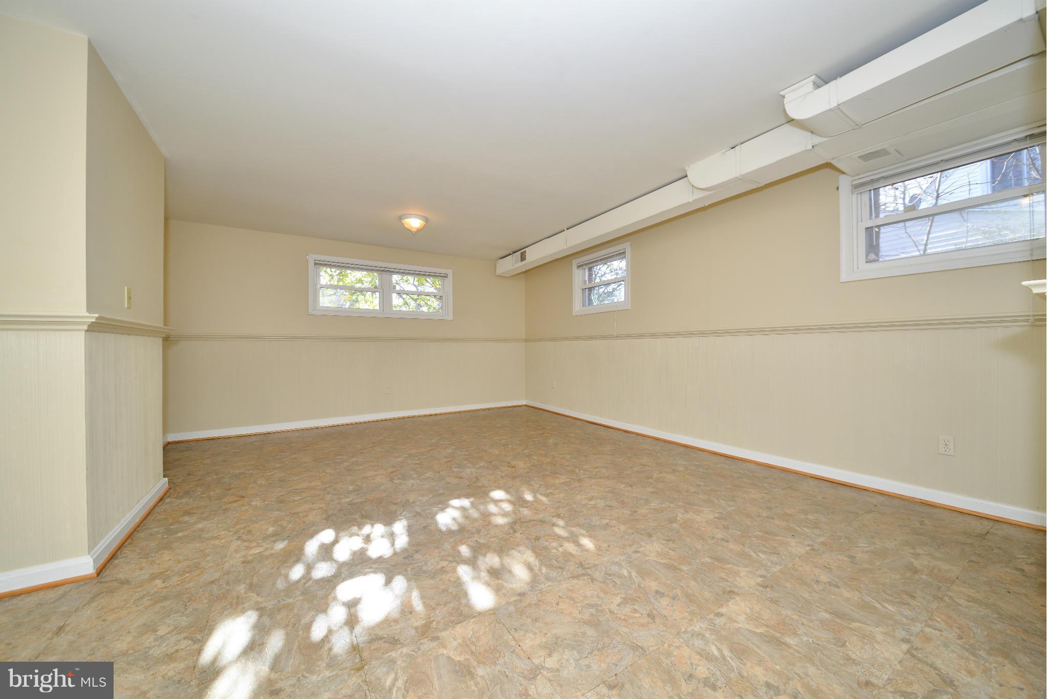 6902 Highland Street Springfield, VA 22150 - Photo 16 of 24 an empty room with windows