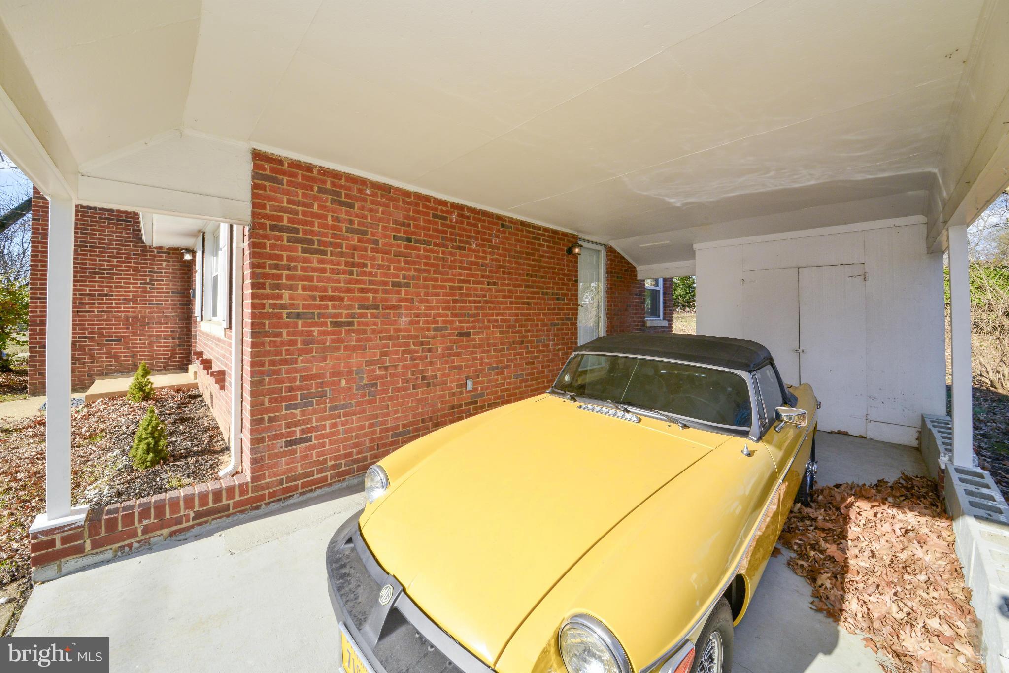 6902 Highland Street Springfield, VA 22150 - Photo 21 of 24 a bedroom with a bed and a large window