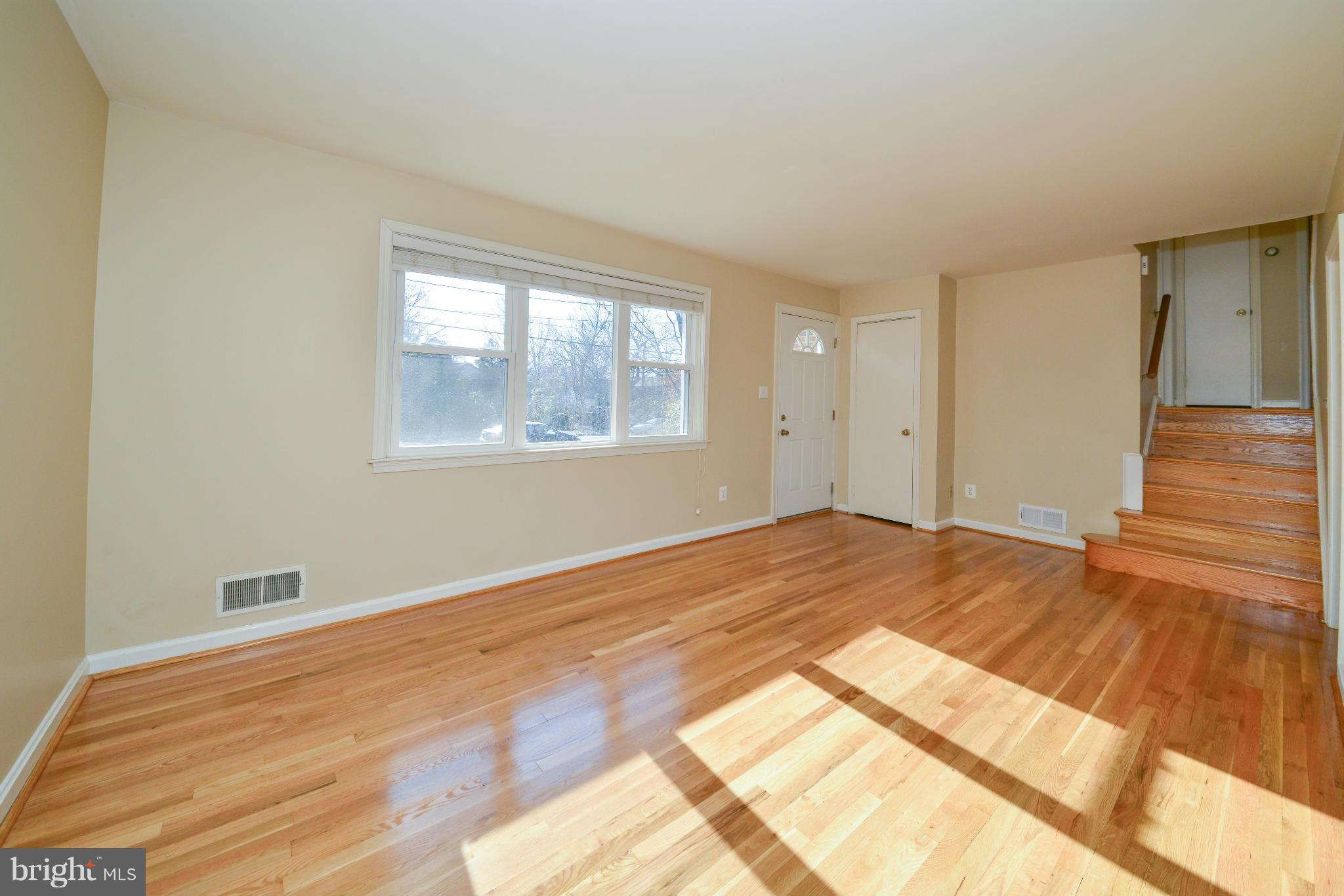 6902 Highland Street Springfield, VA 22150 - Photo 6 of 24 a view of an empty room and window
