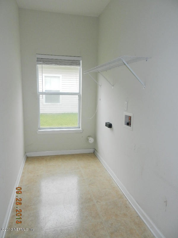 7278 Rampart Ridge Circle South Jacksonville, FL 32244 - Photo 13 of 14 a view of an empty room with a window