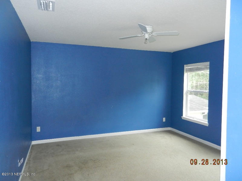 7278 Rampart Ridge Circle South Jacksonville, FL 32244 - Photo 7 of 14 an empty room with a window