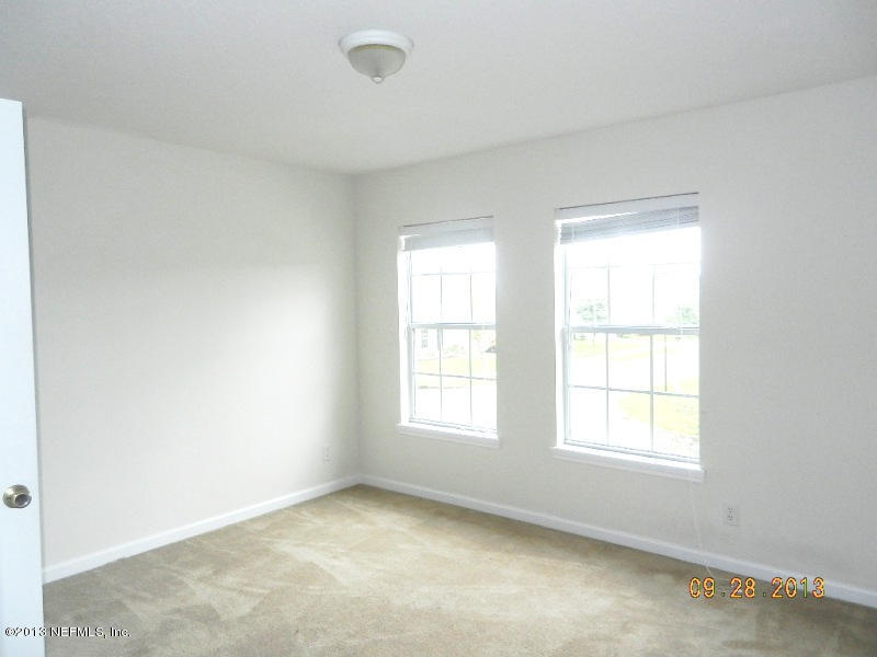 7278 Rampart Ridge Circle South Jacksonville, FL 32244 - Photo 9 of 14 an empty room with a window