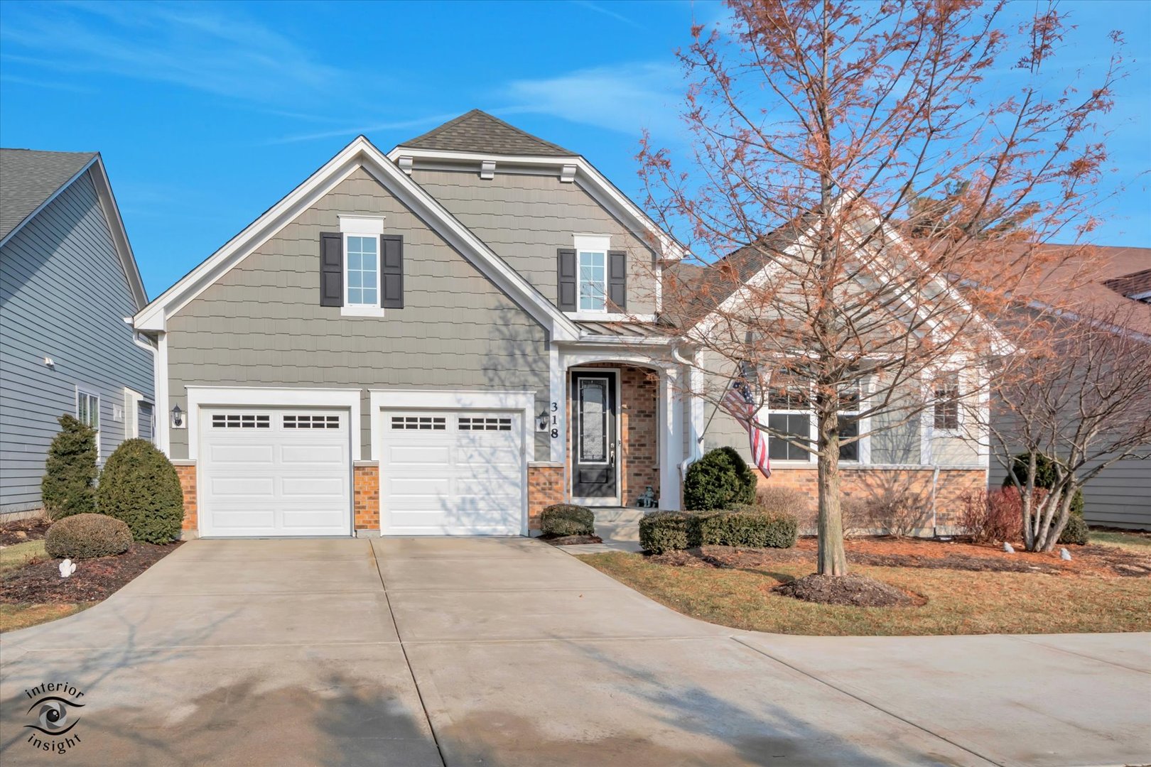 318 Arabian Circle Willowbrook, IL 60527 - Photo 1 of 37 a front view of a house with a yard