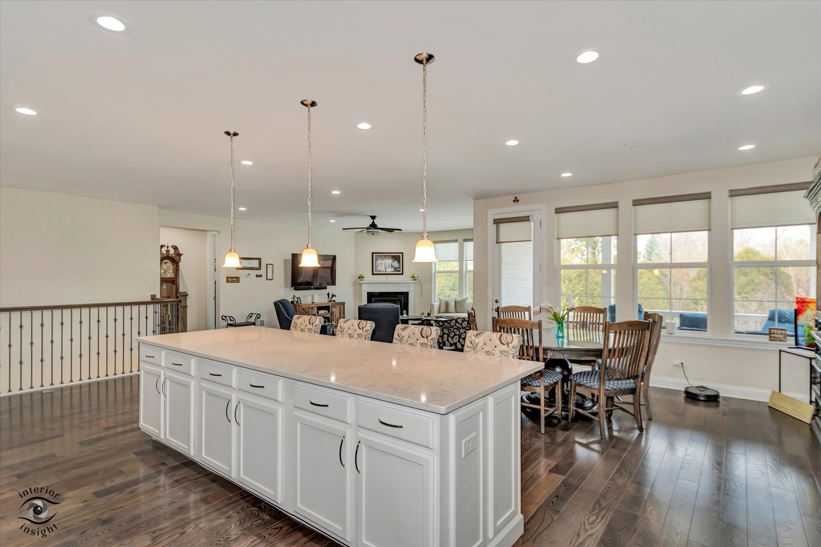 318 Arabian Circle Willowbrook, IL 60527 - Photo 11 of 37 a large kitchen with kitchen island a sink table and chairs