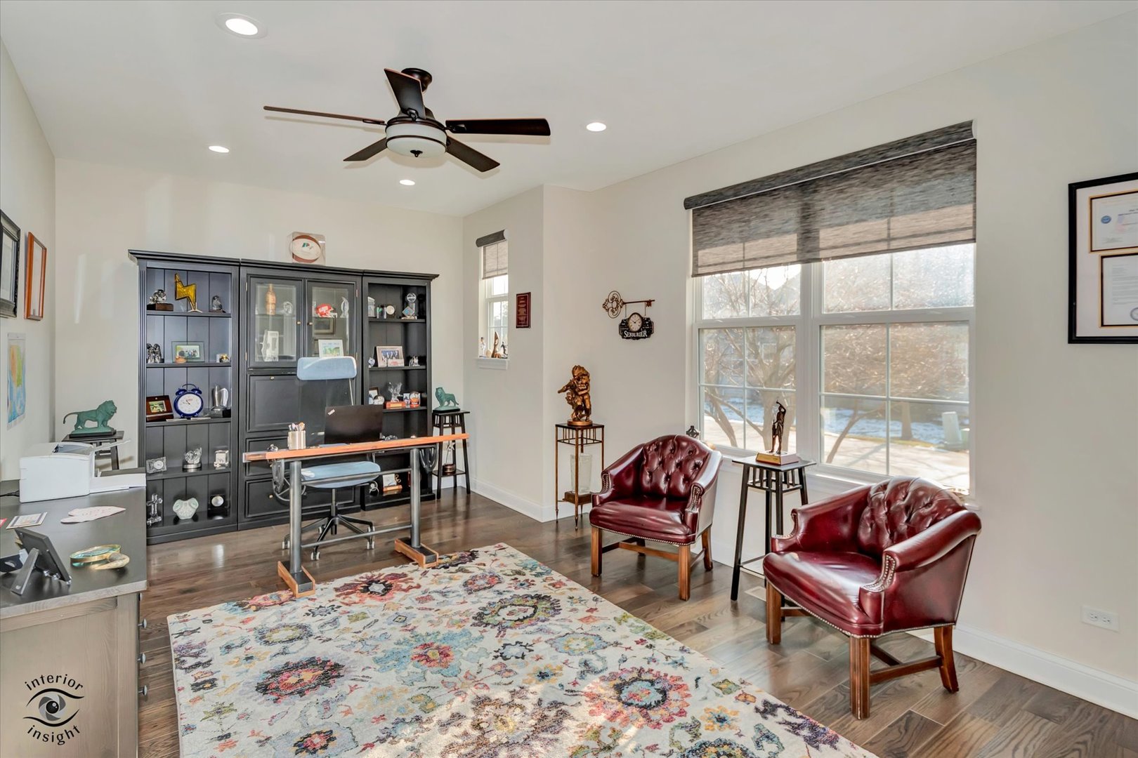 318 Arabian Circle Willowbrook, IL 60527 - Photo 24 of 37 a living room with furniture a rug and a window
