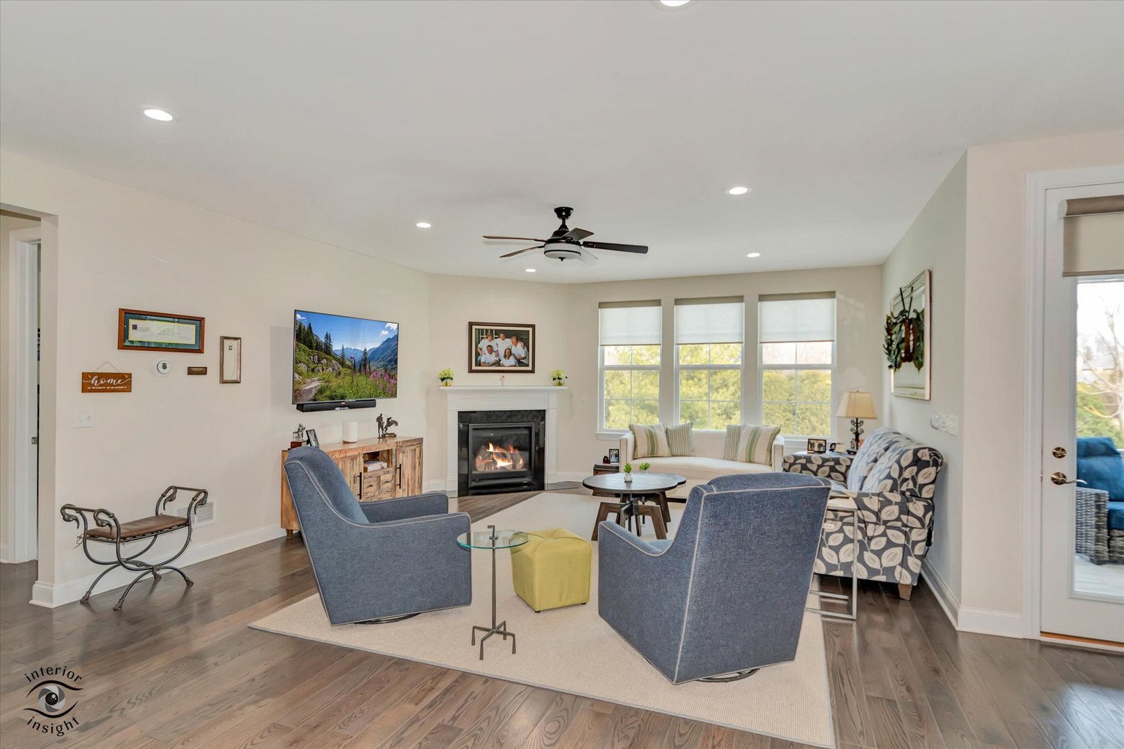 318 Arabian Circle Willowbrook, IL 60527 - Photo 5 of 37 a living room with furniture a large window and a fireplace