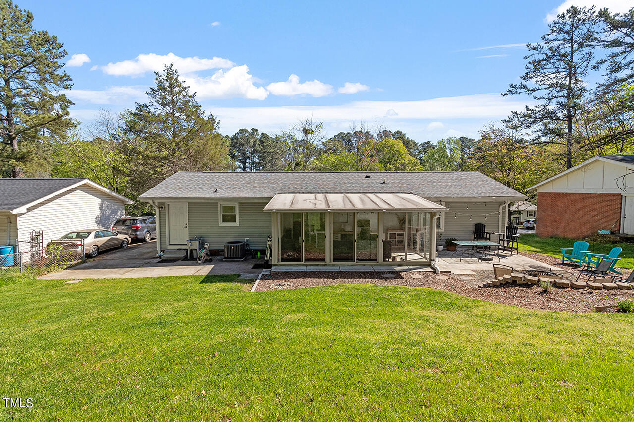 2220 Foxtrot Road Raleigh, NC 27610 - Photo 4 of 24 a view of a house with garden and patio