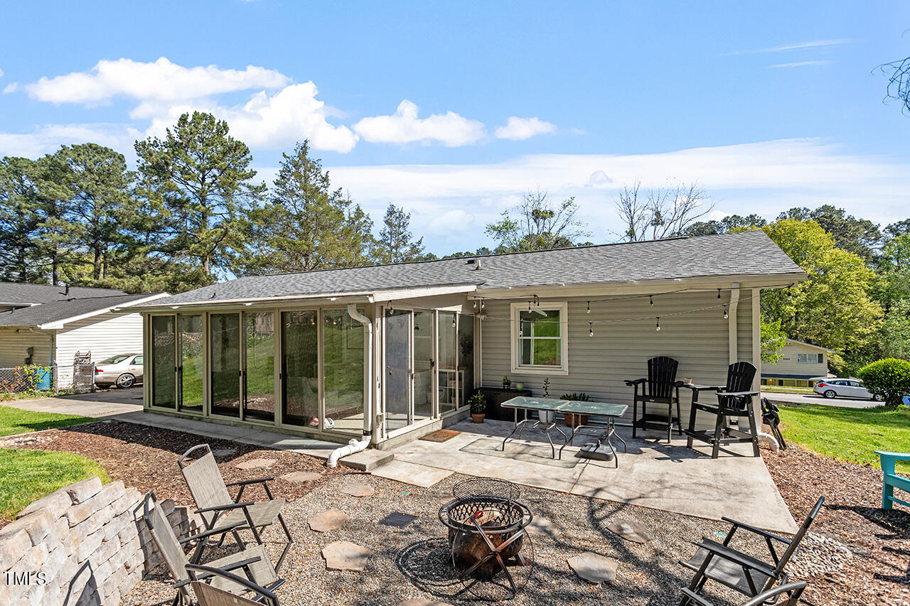 2220 Foxtrot Road Raleigh, NC 27610 - Photo 5 of 24 a view of a house with backyard and sitting area