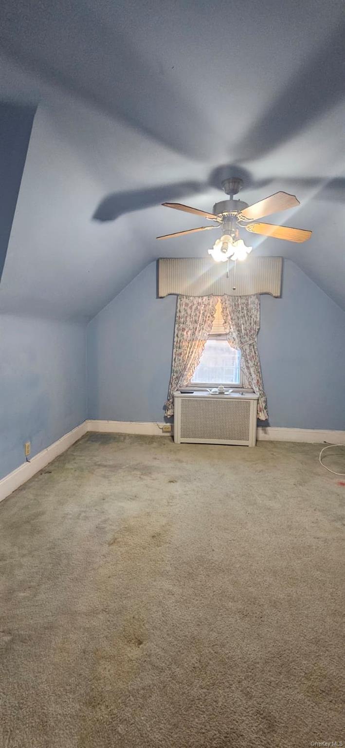 138-39 227th Street Queens, NY 11413 - Photo 13 of 25 a view of empty room with window