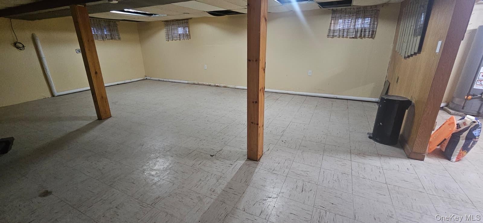 138-39 227th Street Queens, NY 11413 - Photo 19 of 25 view of a room with door