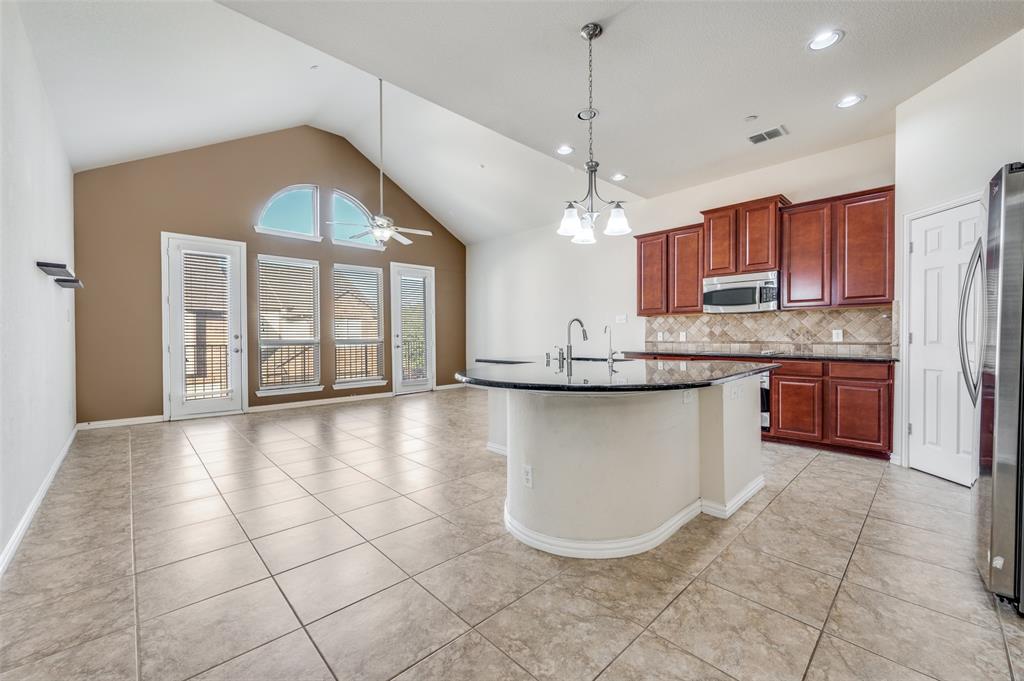 1905 Lantana Lane Irving, TX 75063 - Photo 20 of 21 a view of a kitchen with a sink cabinets and window