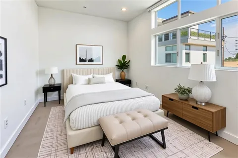 a bedroom with furniture and a couch