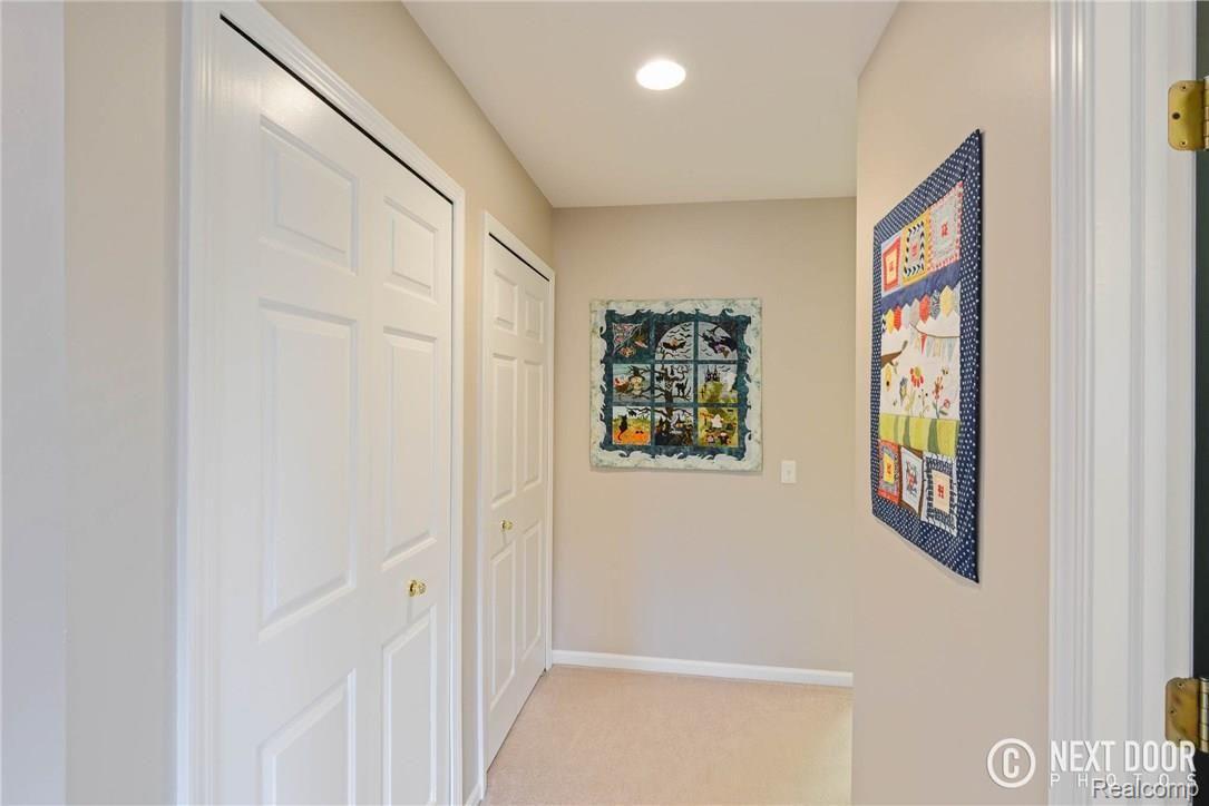 4886 Pleasant Valley Road Brighton, MI 48114 - Photo 29 of 51 Hall to bedrooms, great storage!