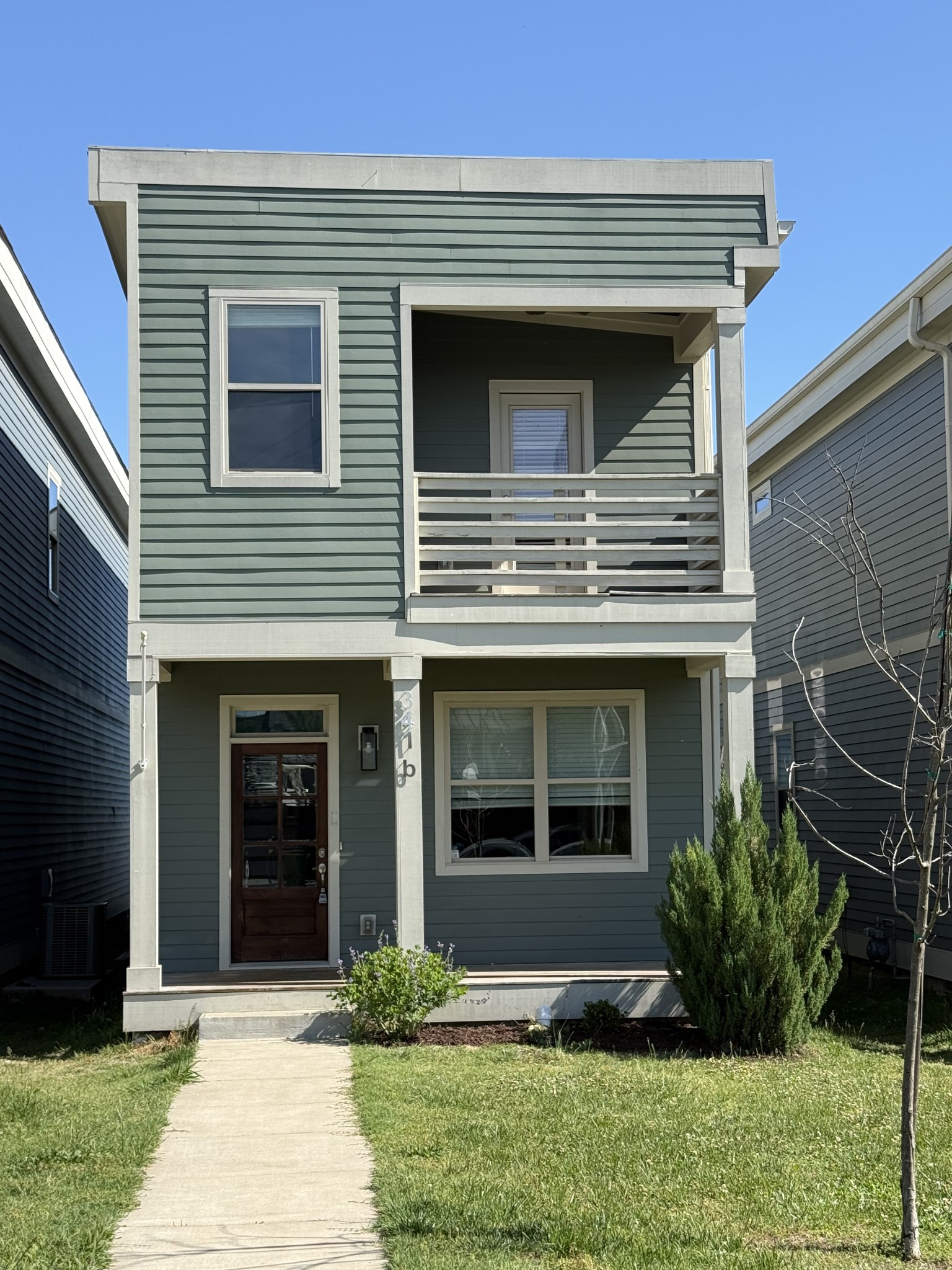 a view of house with yard and outdoor space