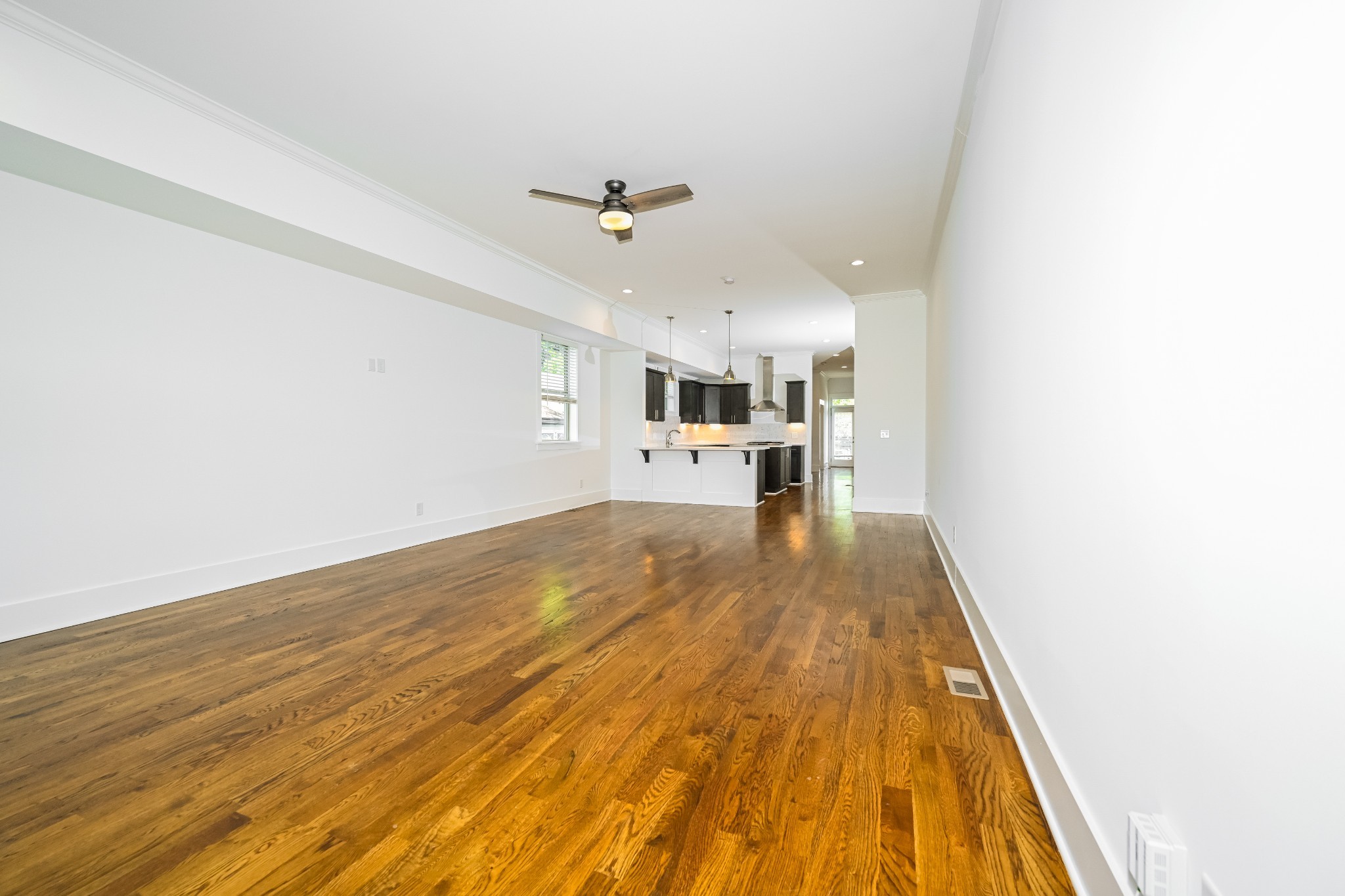 341 Edwin Street, Unit B Nashville, TN 37207 - Photo 11 of 17 a view of a room with wooden floor
