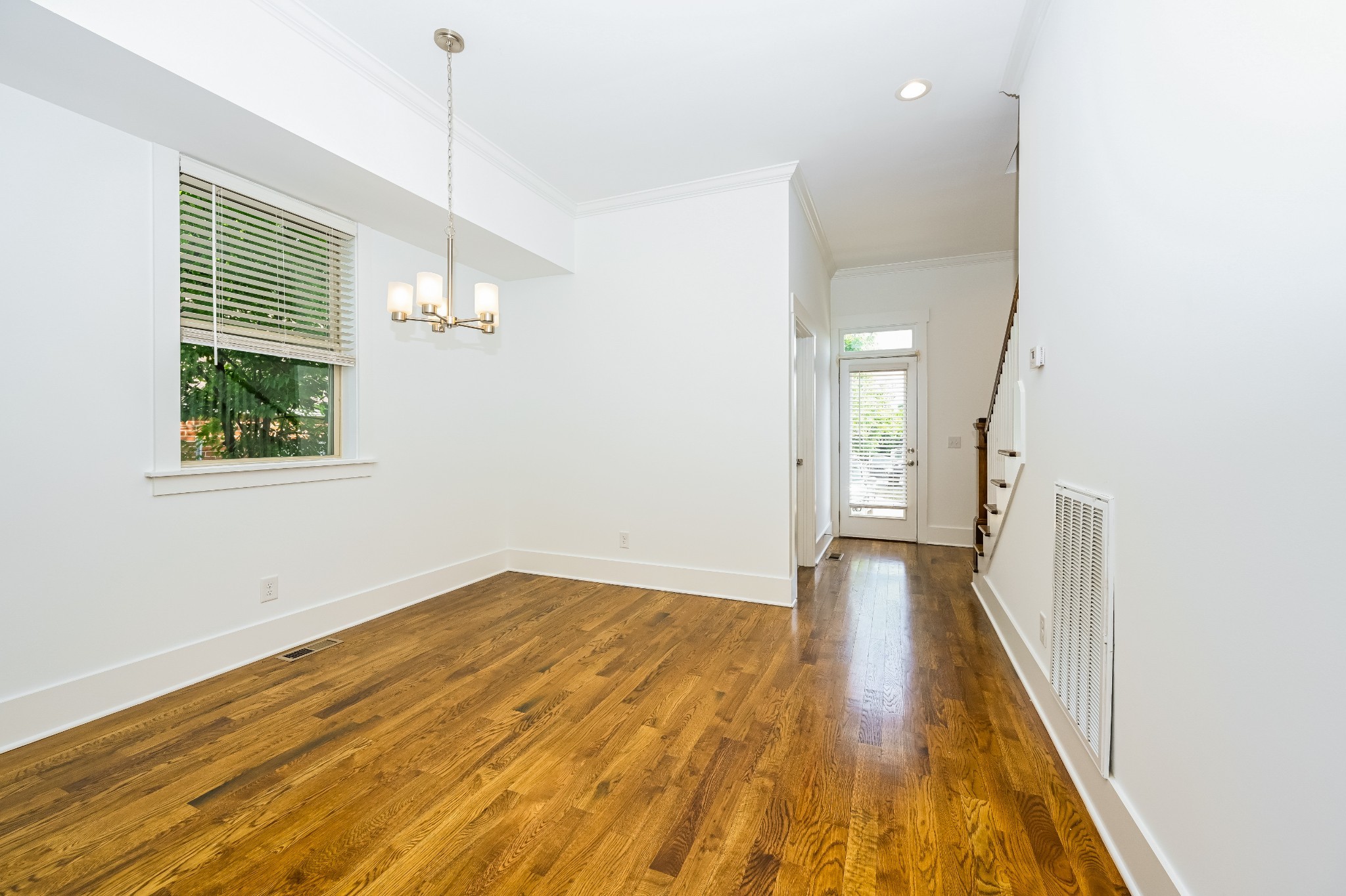 341 Edwin Street, Unit B Nashville, TN 37207 - Photo 12 of 17 a view of a room with wooden floor and window