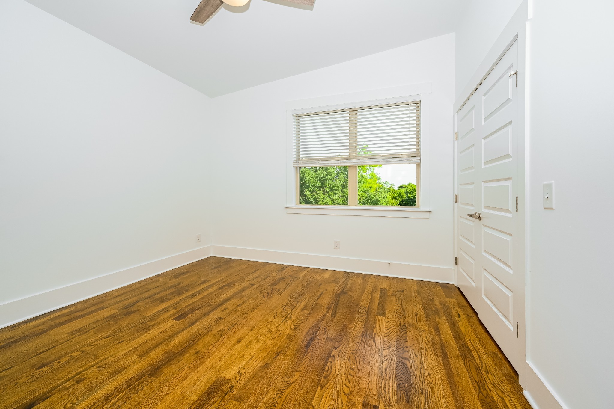 341 Edwin Street, Unit B Nashville, TN 37207 - Photo 6 of 17 a view of a room with wooden floor and window