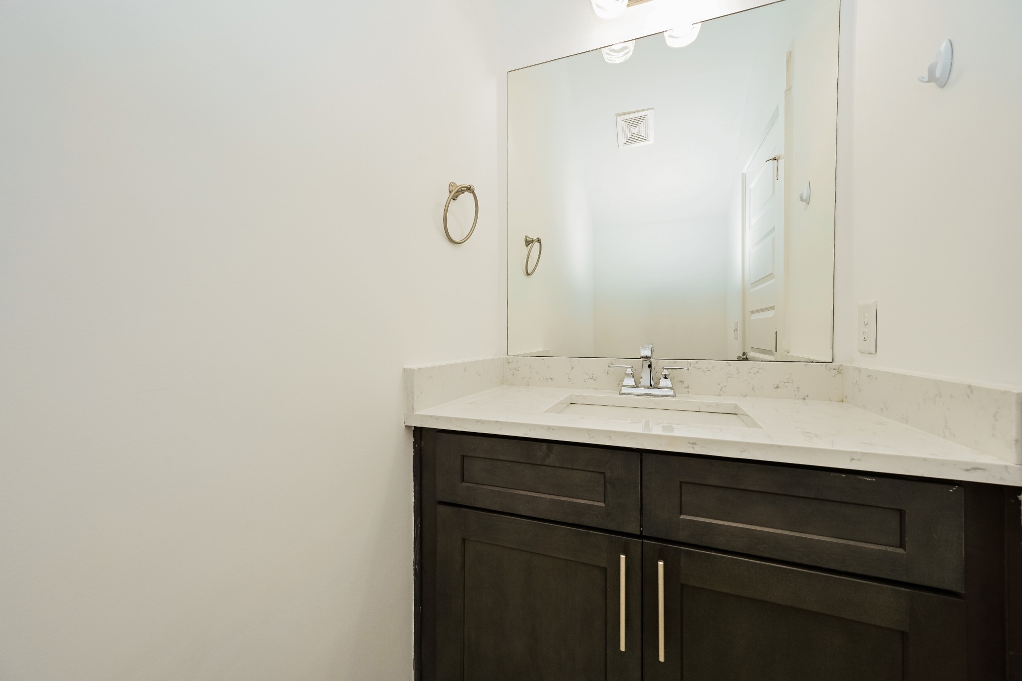341 Edwin Street, Unit B Nashville, TN 37207 - Photo 8 of 17 a bathroom with a sink and a mirror