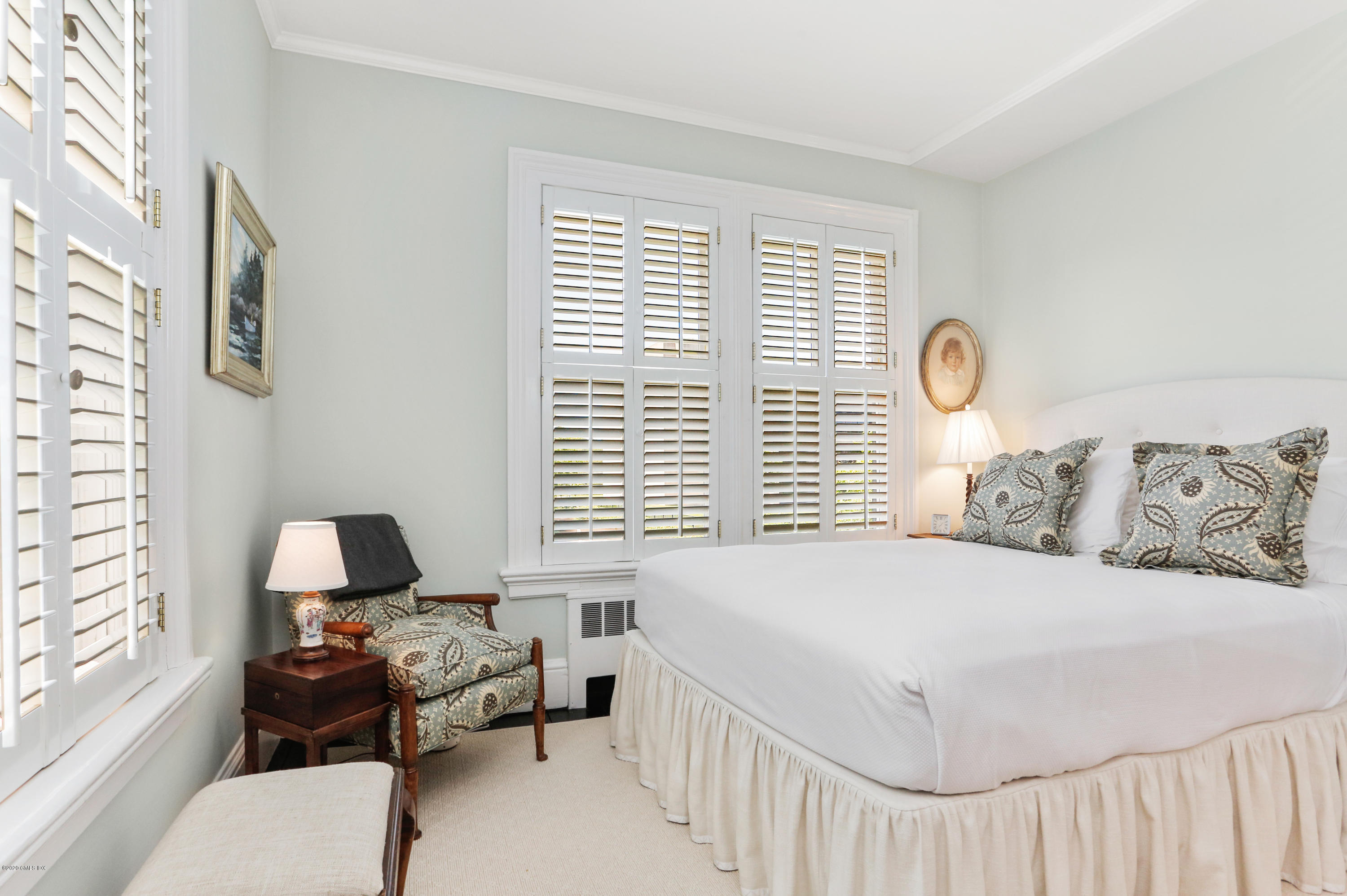 619 Steamboat Road Greenwich, CT 06830 - Photo 12 of 27 a bedroom with a bed and a window