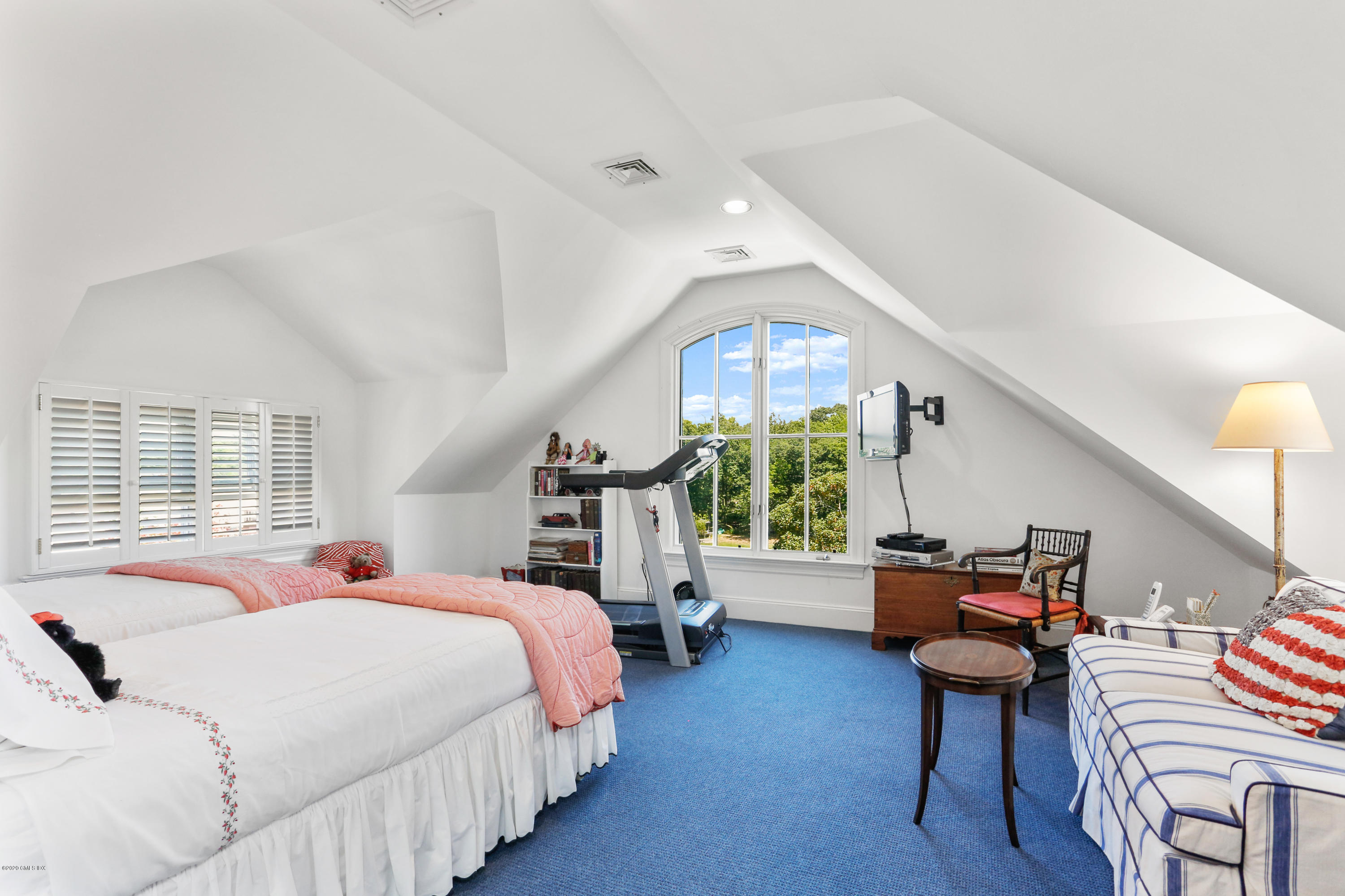 619 Steamboat Road Greenwich, CT 06830 - Photo 16 of 27 a bed room with a bed and a chair