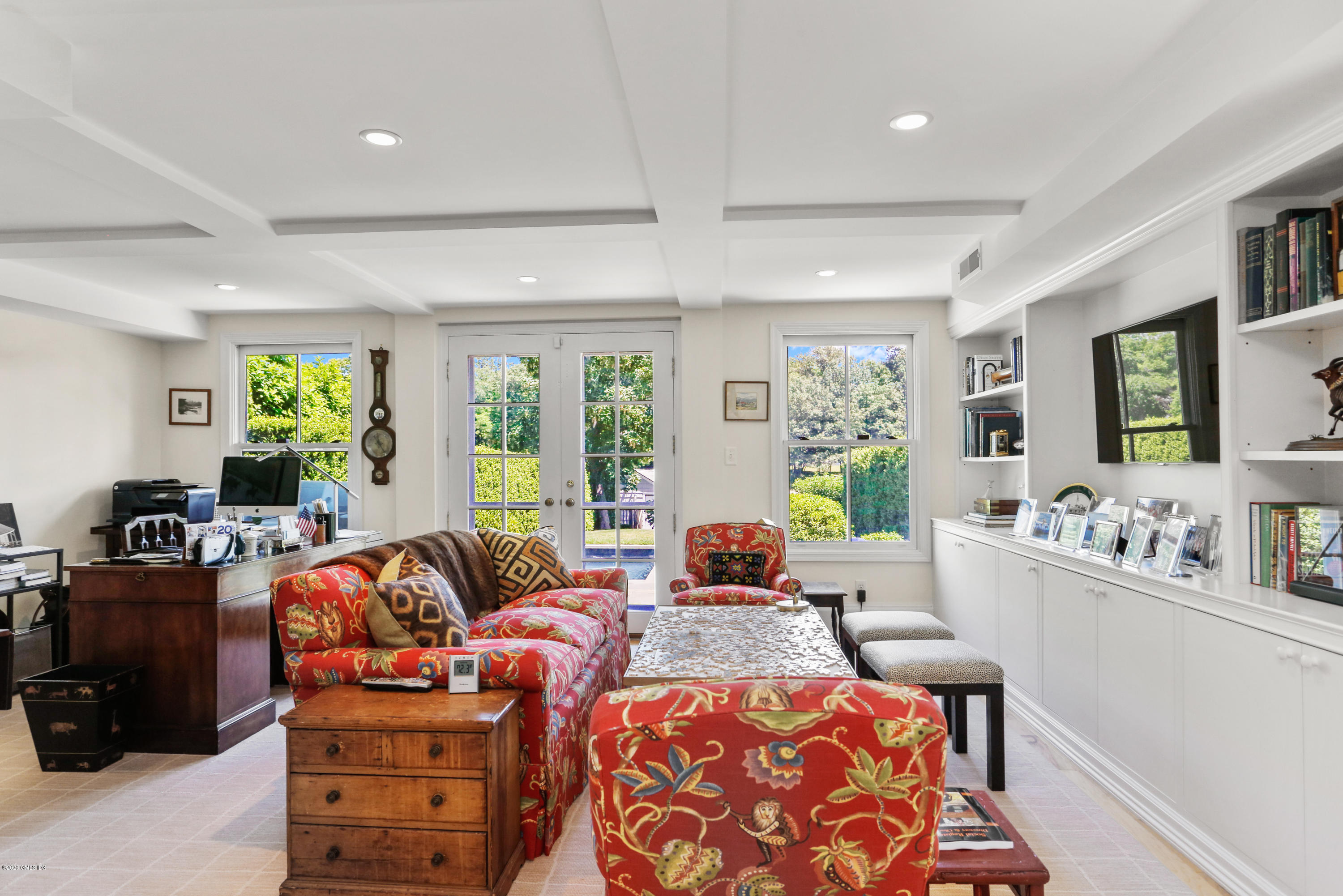 619 Steamboat Road Greenwich, CT 06830 - Photo 17 of 27 a living room with furniture and large windows