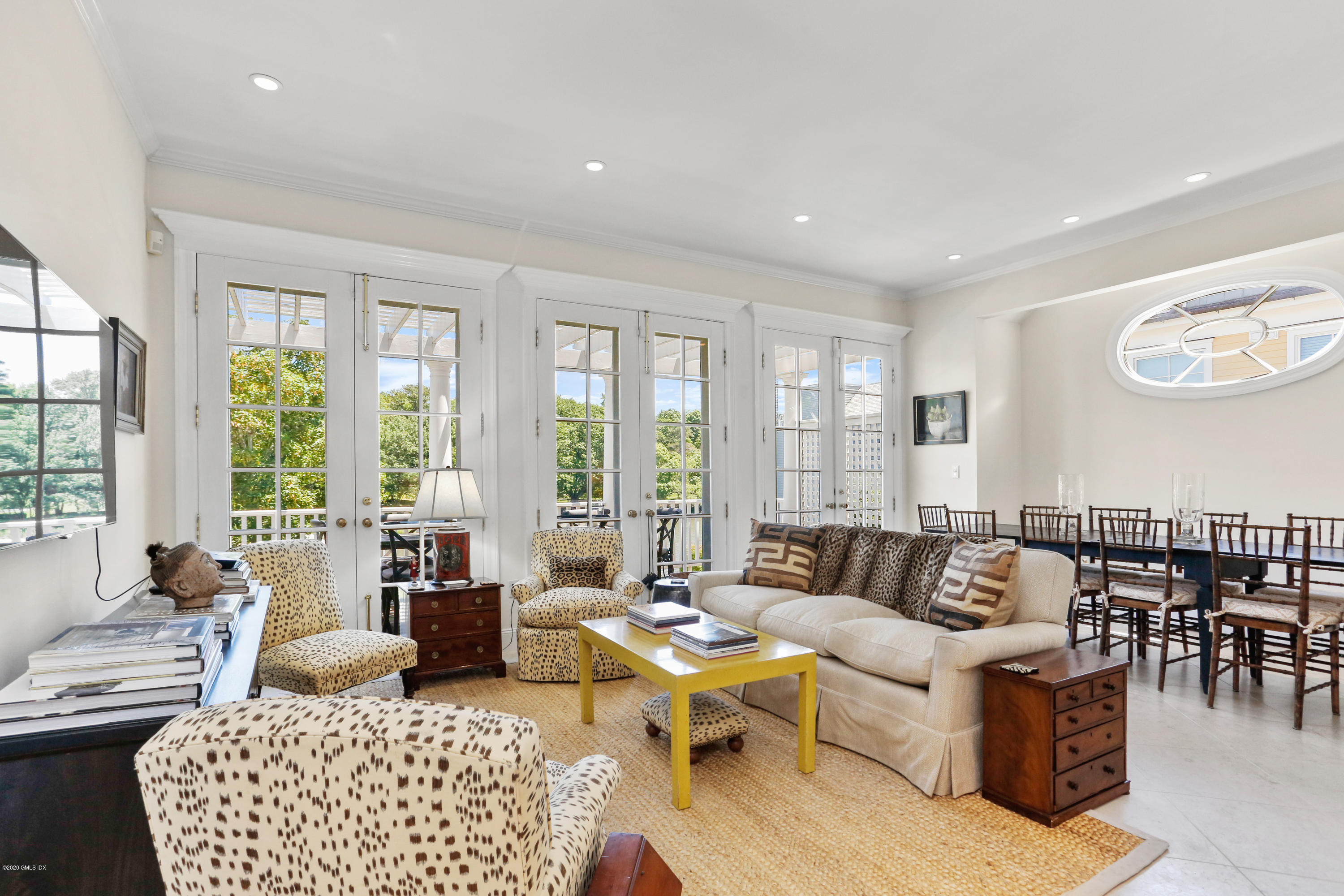 619 Steamboat Road Greenwich, CT 06830 - Photo 8 of 27 a living room with furniture and a large window