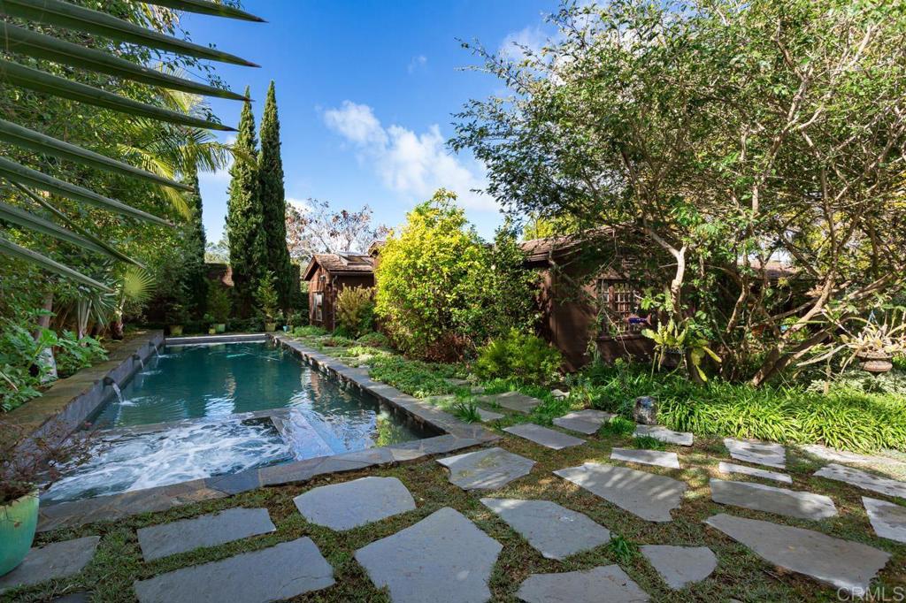 a backyard of a house with lots of green space