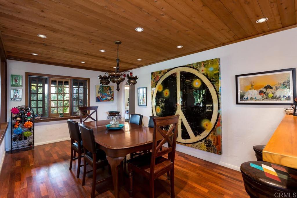 1249 Melba Road Encinitas, CA 92024 - Photo 16 of 47 a view of a livingroom with furniture wooden floor and a rug