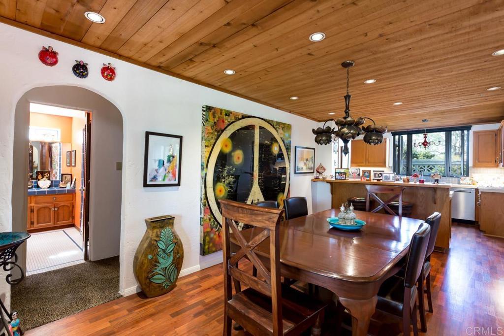 1249 Melba Road Encinitas, CA 92024 - Photo 17 of 47 a view of a dining room with furniture and wooden floor